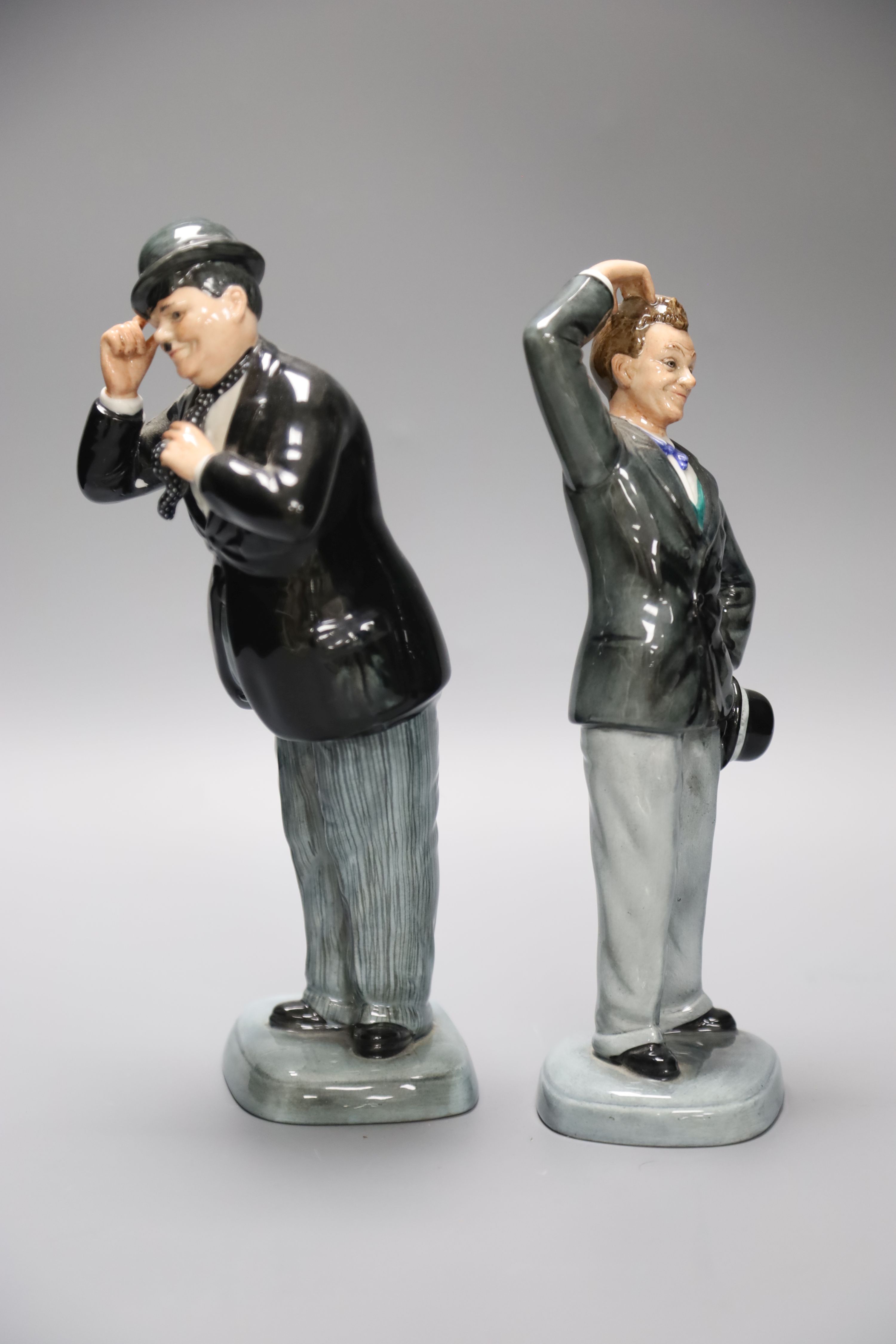 A Royal Doulton Oliver Hardy, HN2775, together with Stan Laurel, HN2774 (a.f.)